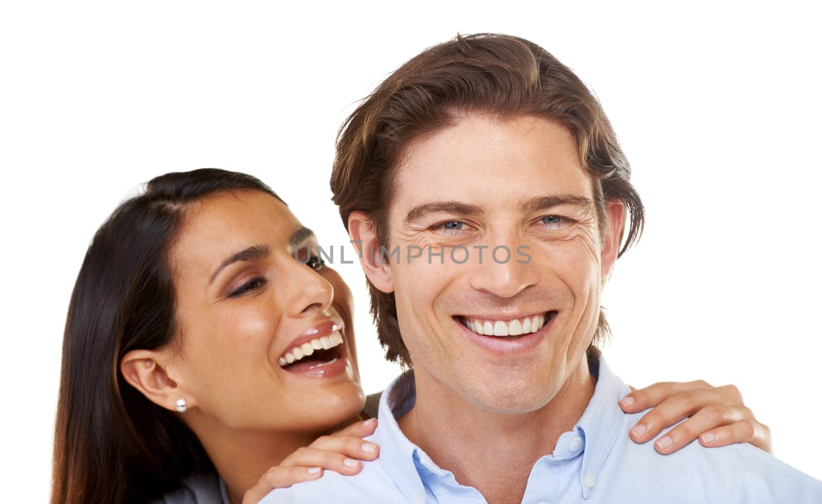 Portrait, love and happy couple together on a date hugging in happiness and smiling isolated in a studio white background. Portrait, lovers and man with woman for romance in a relationship by YuriArcurs