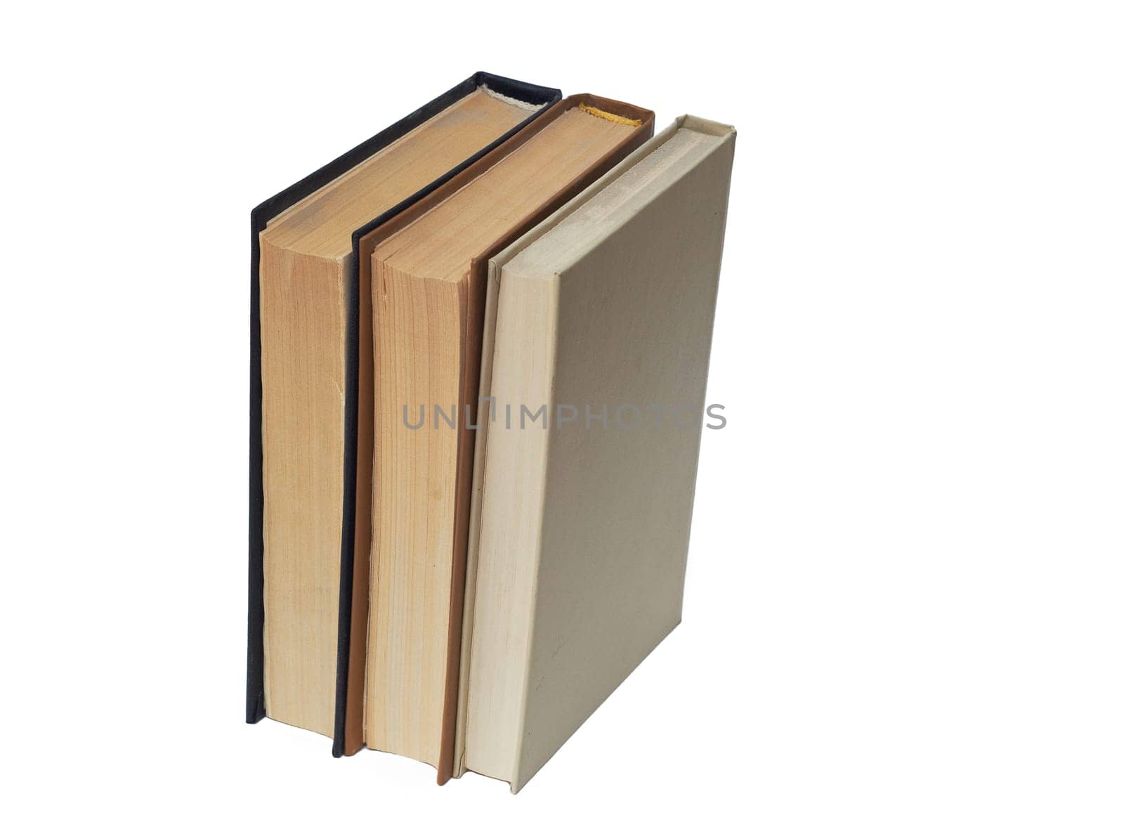 A stack of old hardcover books highlighted on a white background