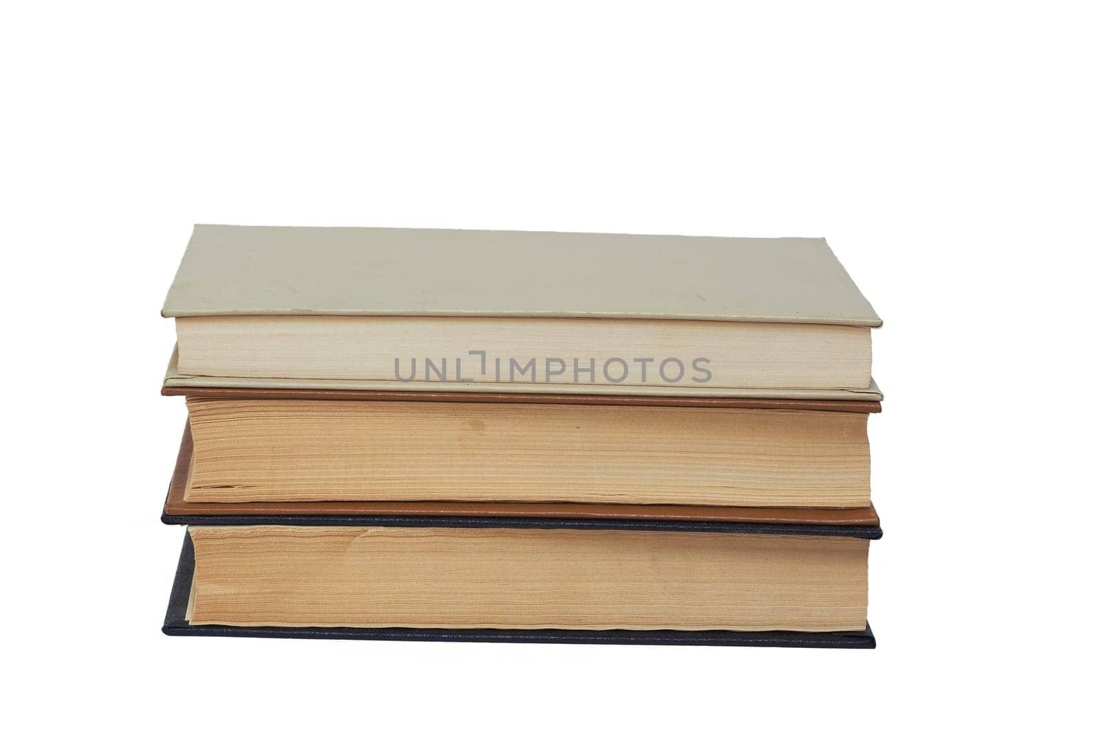 A stack of old hardcover books highlighted on a white background