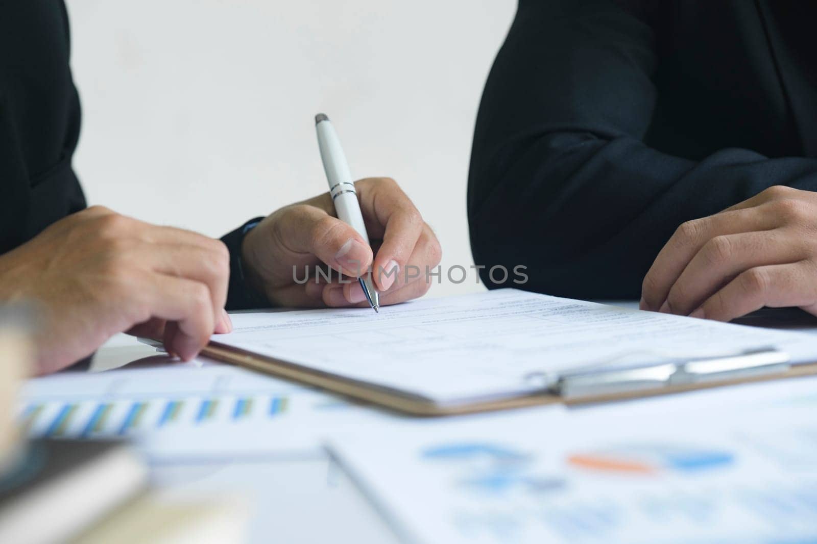 Business man sign a contract investment professional document agreement. by ijeab