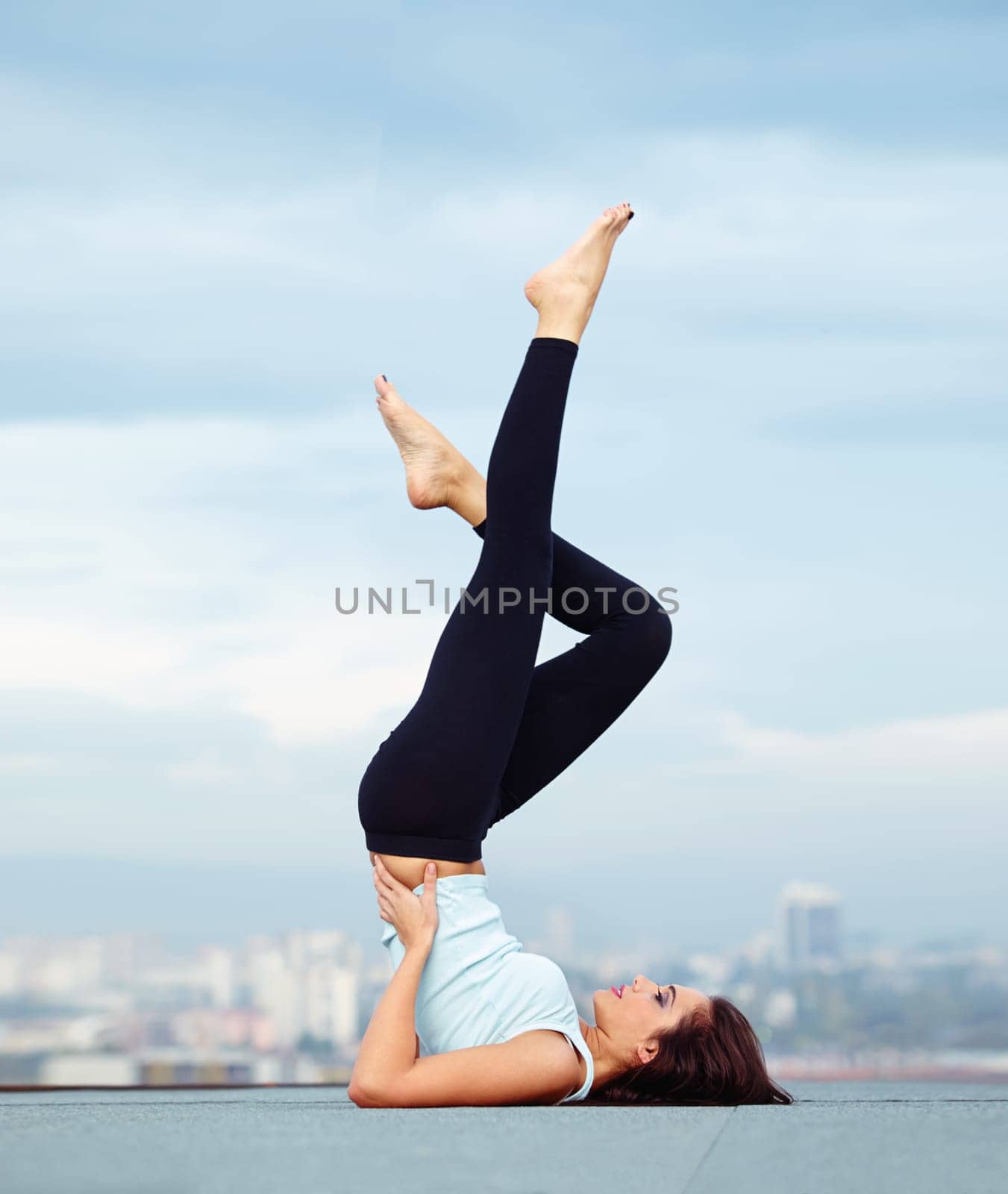 Yoga, stretching legs and woman with cityscape, health and wellness with balance for healthy body exercise. Health care, pilates and mindfulness, workout for girl and view of city from rooftop mockup.