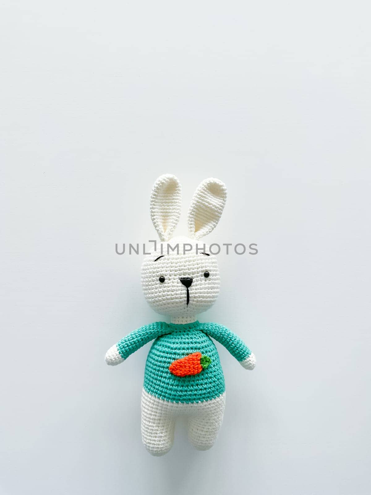 Soft white crochet bunny. on a white background. by Lunnica