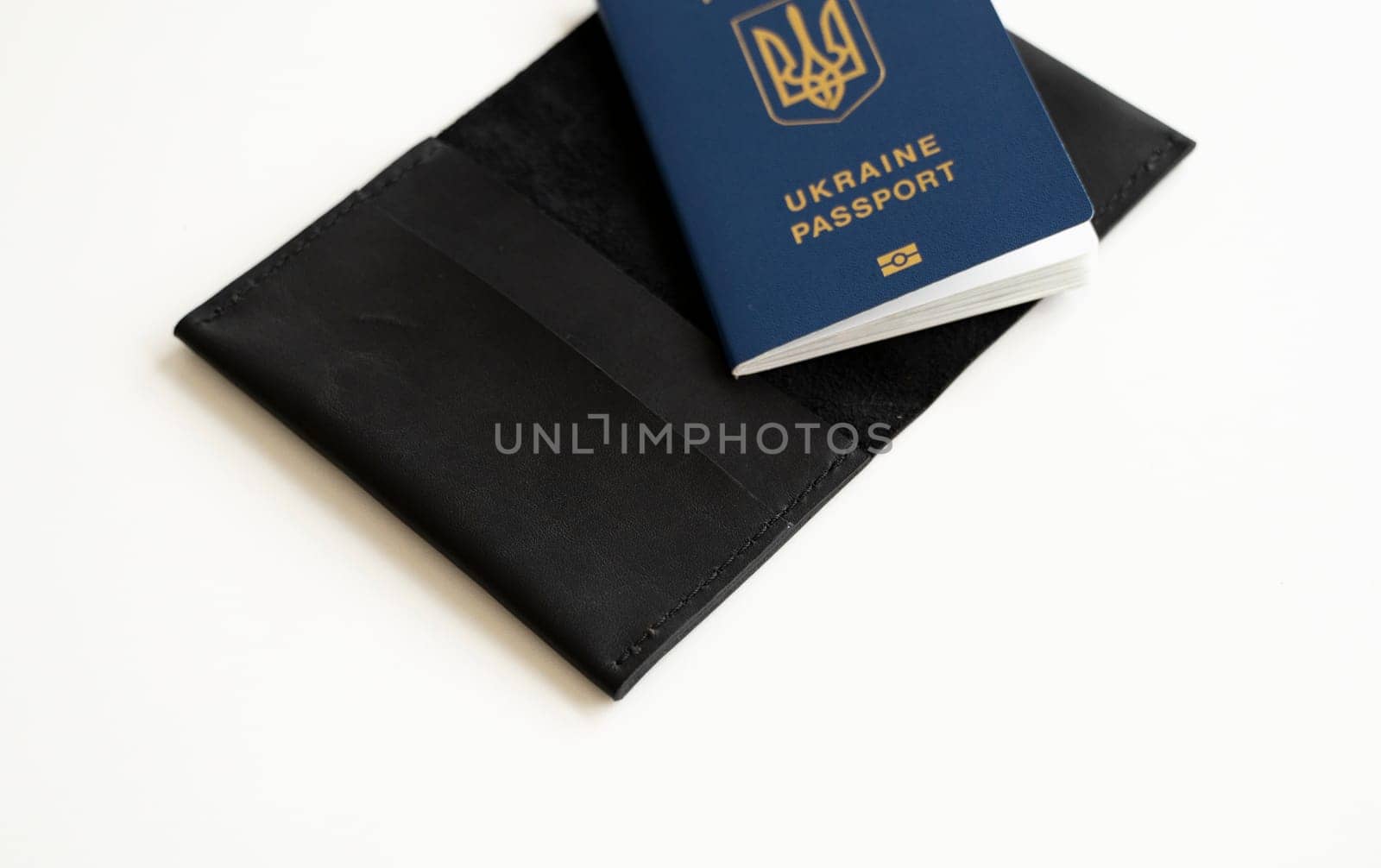Ukrainian biometric passport id with a genuine leather cover on a white background