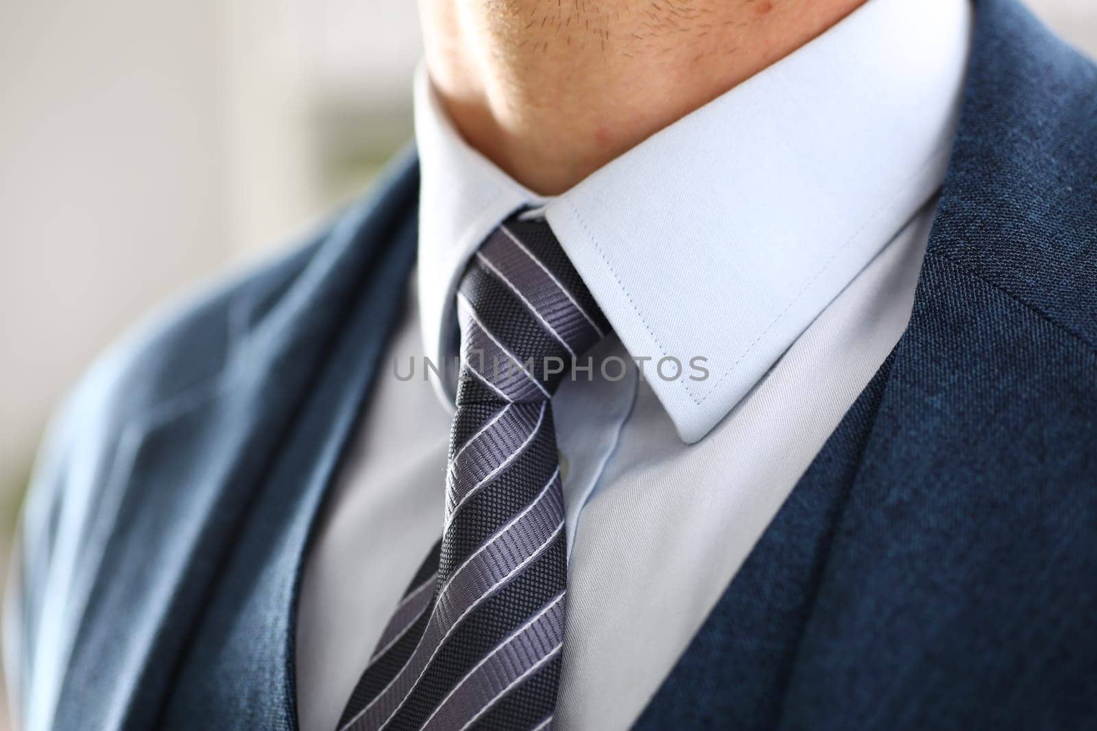 Male arm in blue suit set tie closeup. White collar management job serious move secretary student luxury formal interview executive agent marriage store corporate elegance employment preparation