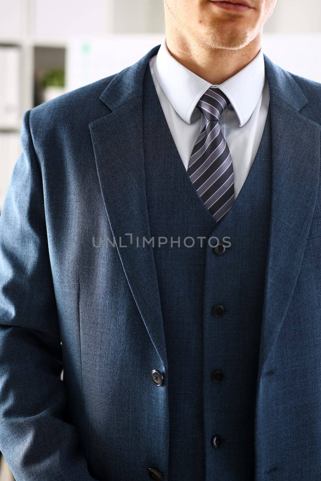 Male arm in blue suit set tie closeup. White collar management job serious move secretary student luxury formal interview executive agent marriage store corporate elegance employment preparation