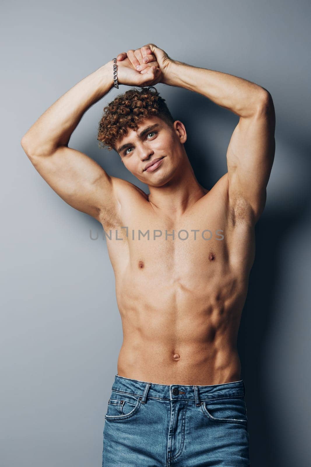 man body curly handsome beauty young bodybuilder adult standing gray male athlete