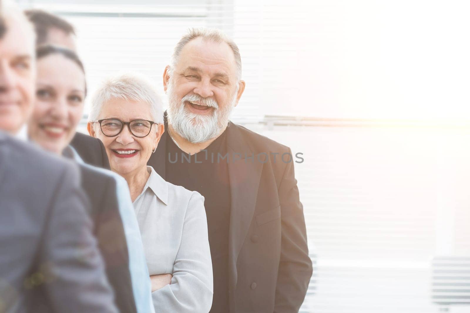 close up. a group of diverse business people standing in line. business concept