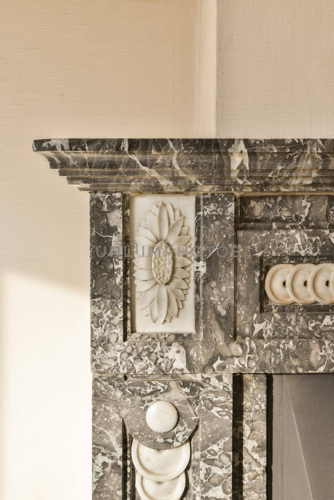 the fireplace in the guest room is made of marble by casamedia