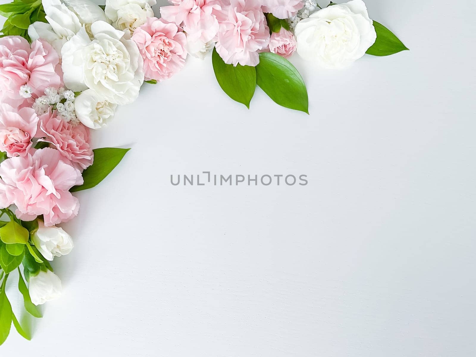 Pink floral. assorted pink flowers border on white background. with empty space for inscription or text