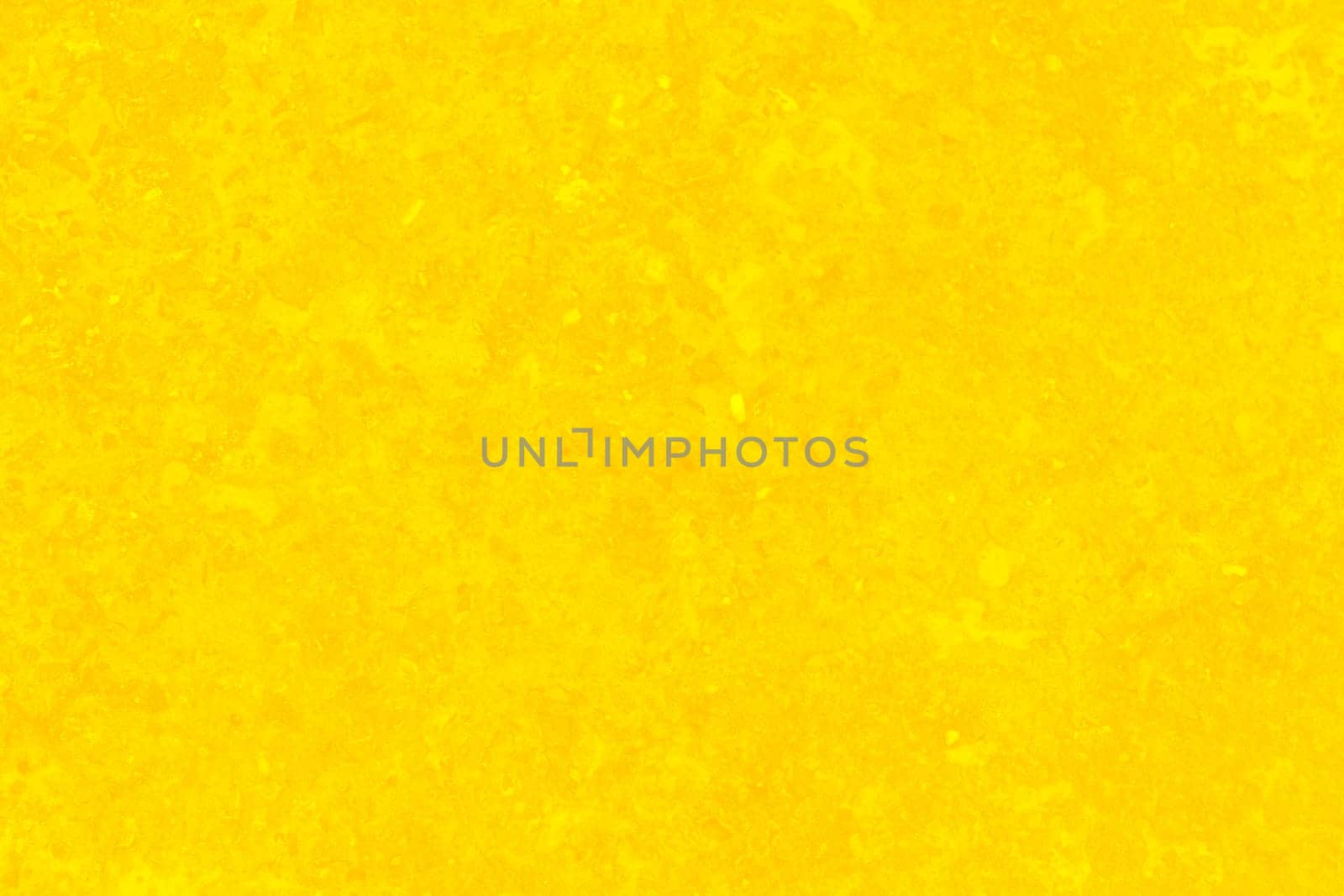 Yellow concrete or cement material in abstract wall background texture.