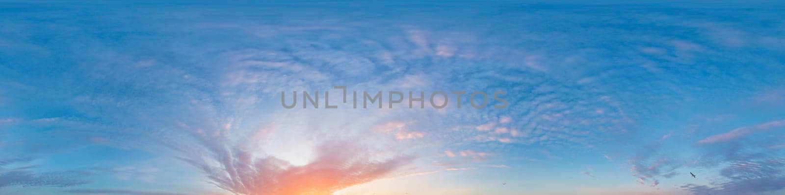 Bright sunset sky panorama with Cirrus clouds. Seamless hdr spherical equirectangular 360 panorama. Sky dome or zenith for 3D visualization, game and sky replacement for aerial drone 360 panoramas.