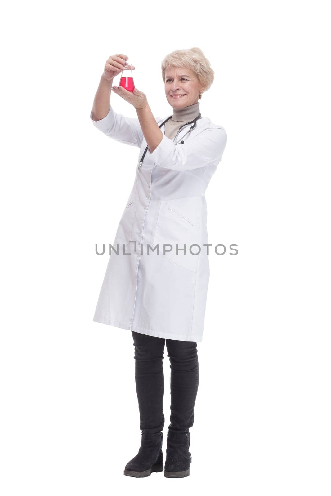 in full growth. female doctor with a laboratory flask . isolated on a white background.