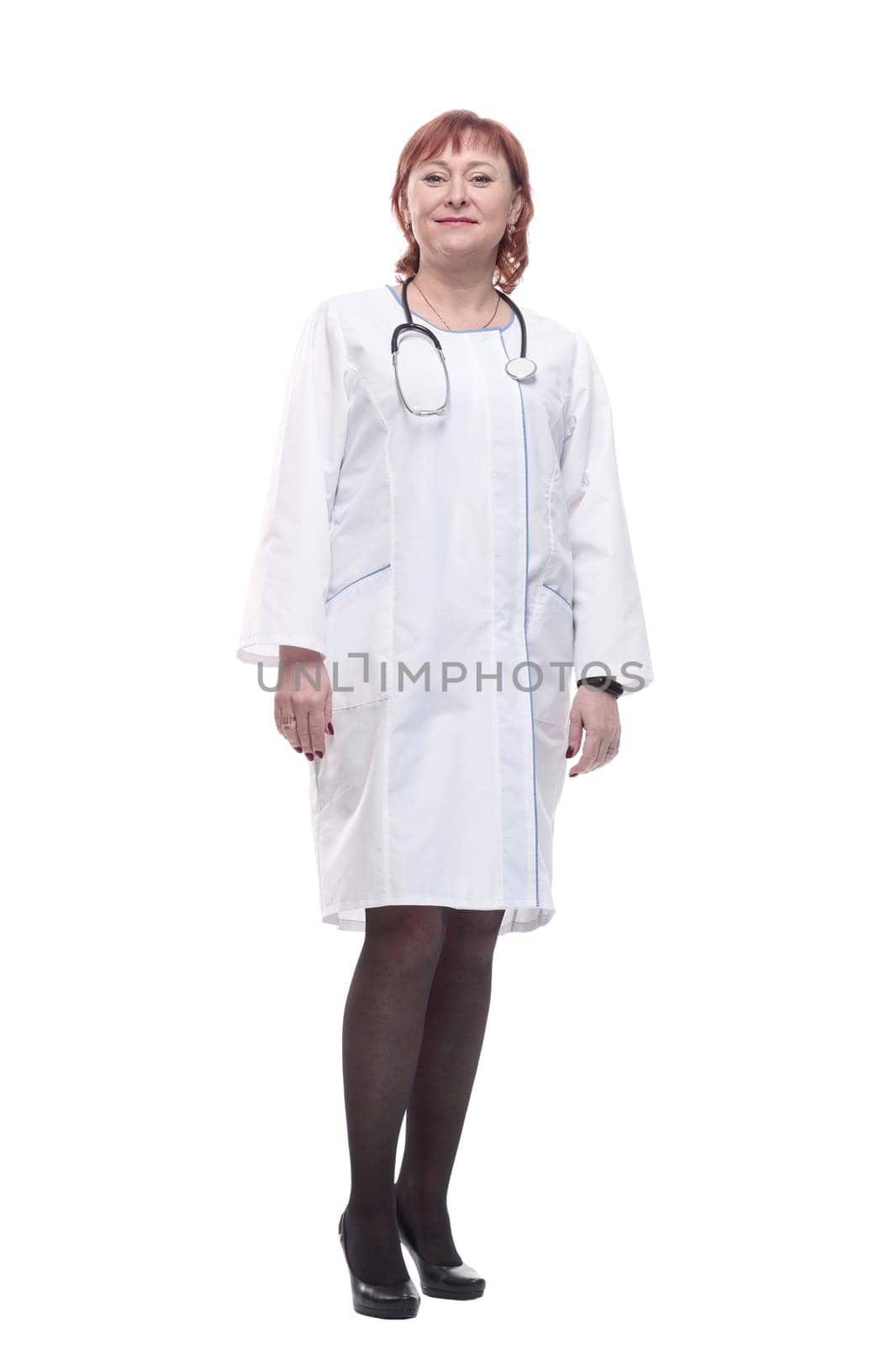 in full growth. successful female doctor with a stethoscope. isolated on a white background.