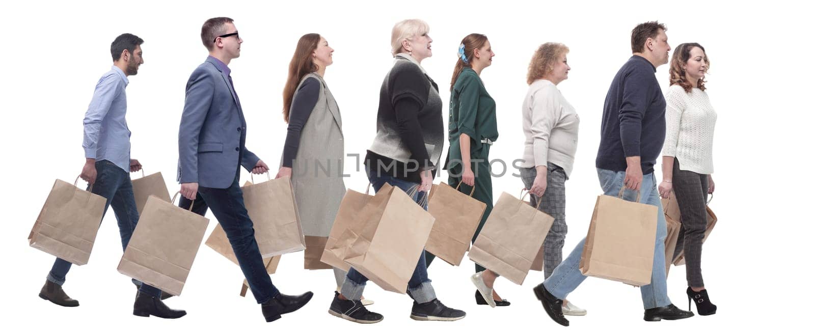 a group of people stand in line with shopping bags. isolated on white
