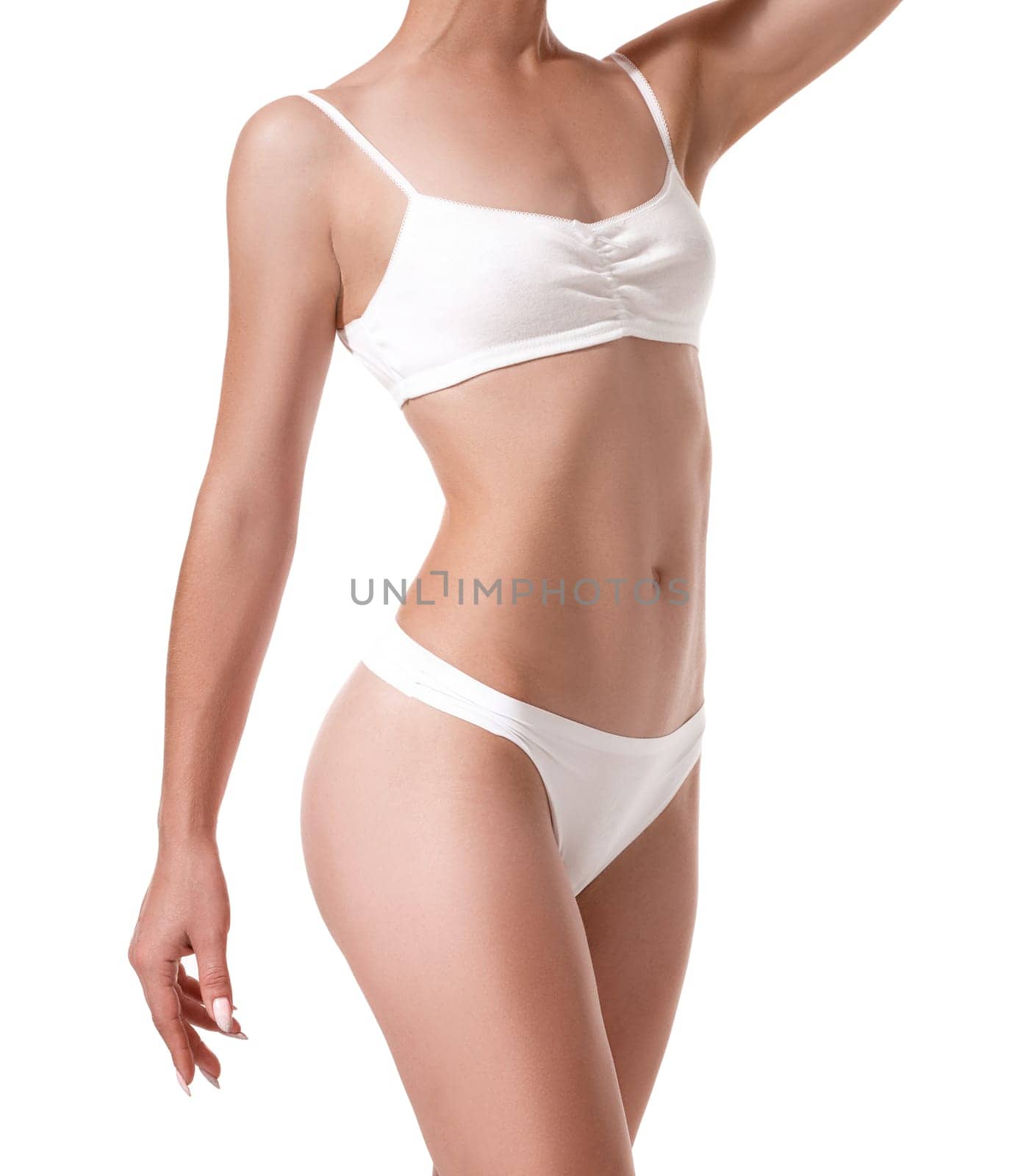 Beautiful healthy fit slim female body on white background. Sport. Health. Concept