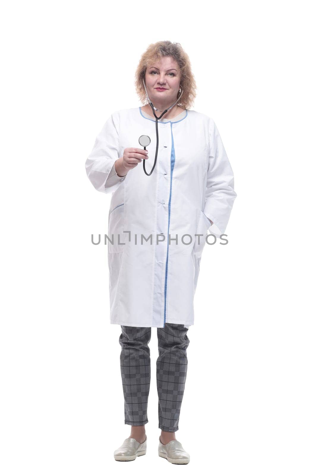 senior female doctor with a stethoscope in her hands. isolated on a white background.