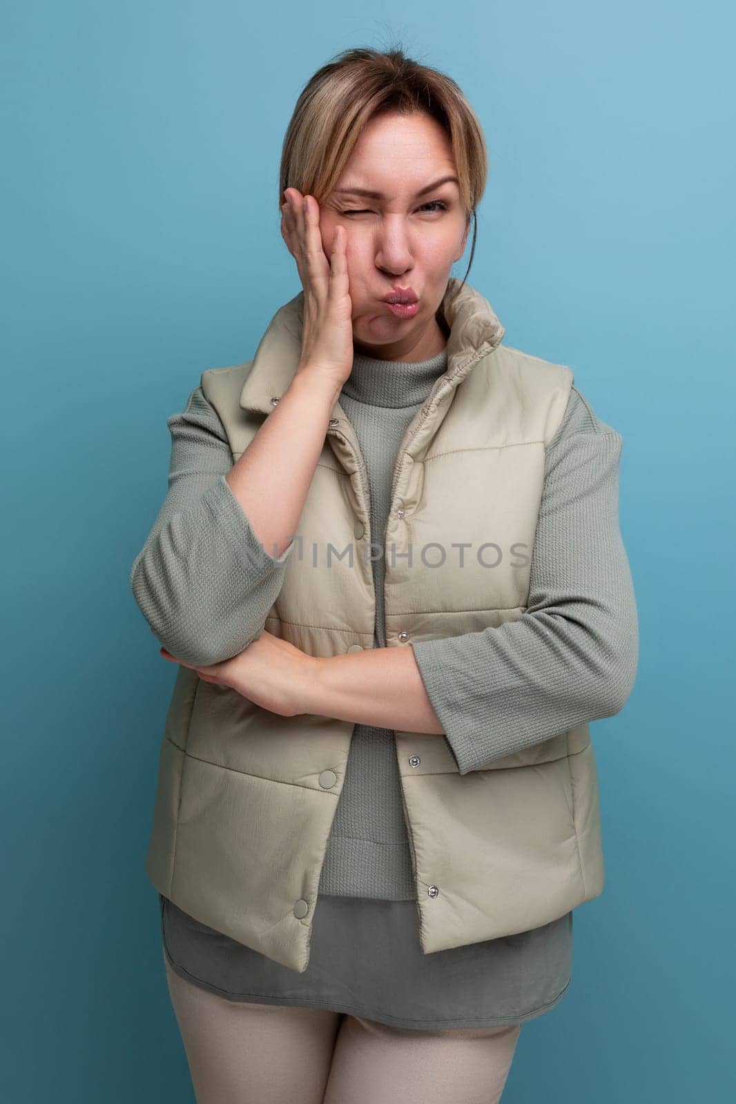 upset european young blond woman in casual outfit is sad.