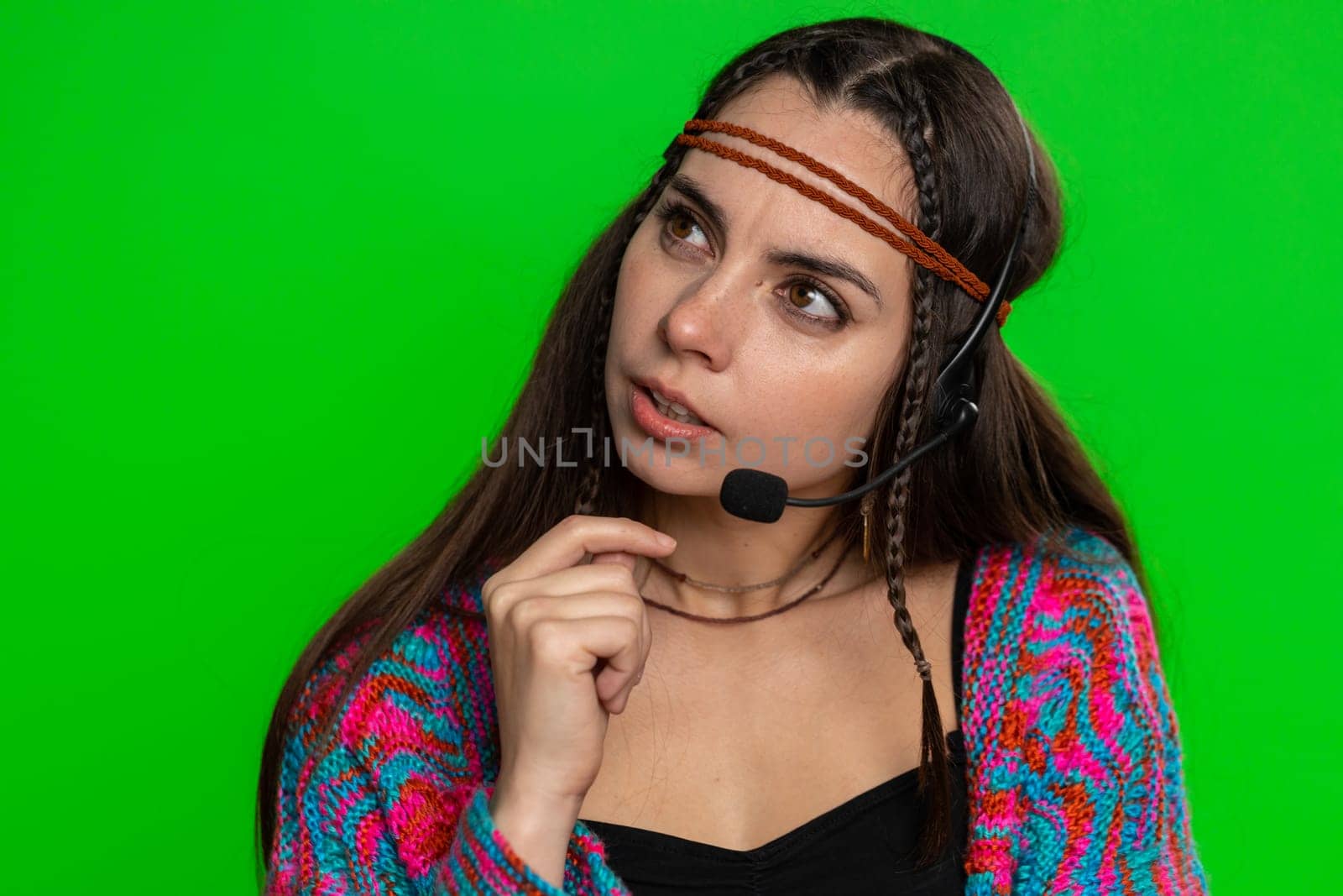Smiling woman wearing headset, freelance worker, call center or support service operator helpline, having talk with client or colleague, communication support. Girl isolated on chroma key background