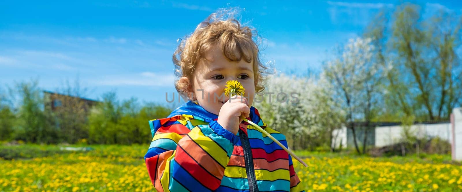 The child is allergic to flowers. Selective focus. Nature.