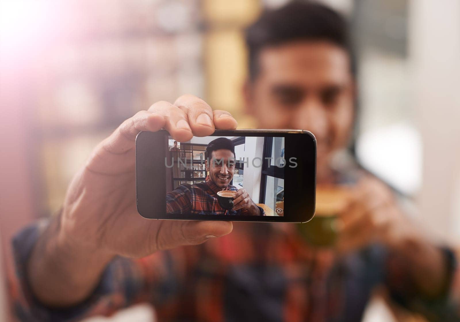 Capture the moment. a young man taking a selfie