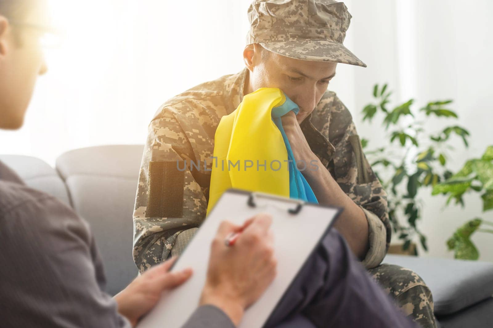 Psychologist working with military officer from Ukraine.