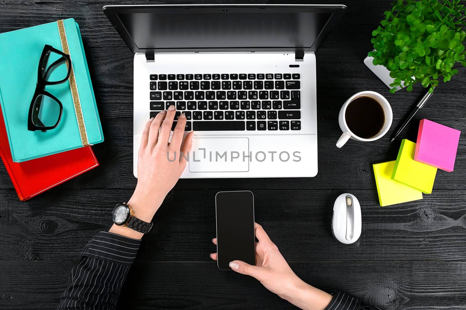 Overhead view of businesswoman working at computer in office. Place for your text. Ideal for blog. Flat lay