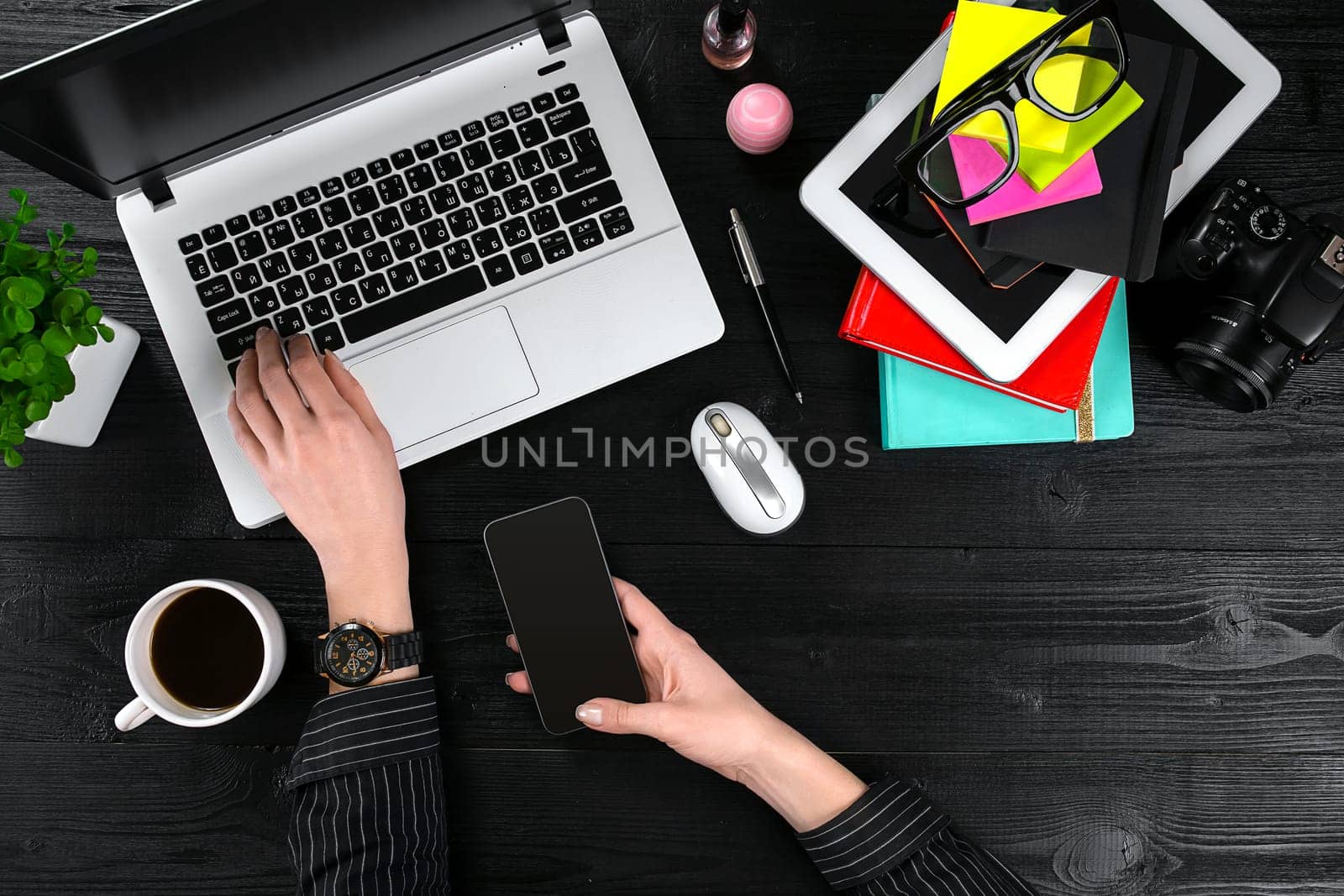 Overhead view of businesswoman working at computer in office. Place for your text. Ideal for blog. flat lay on black background