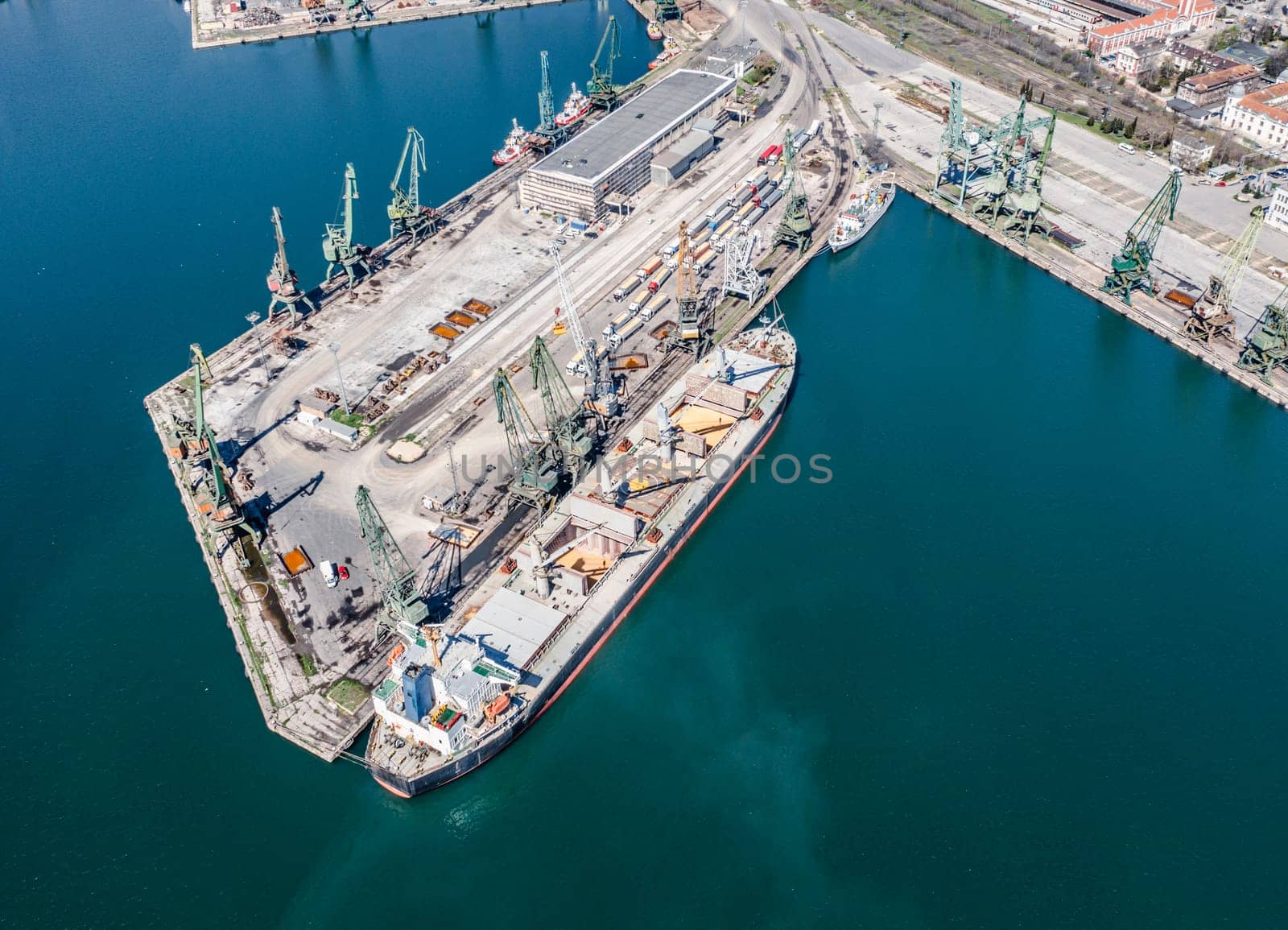 13.04.2023 Varna Black sea Port, Bulgaria - Cargo ship drain Sludge Sewage water or Chemical Waste to the Ocean sea during loading in port