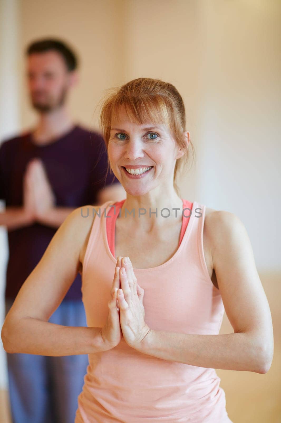 Whats your favorite position. a woman doing a yoga class. by YuriArcurs