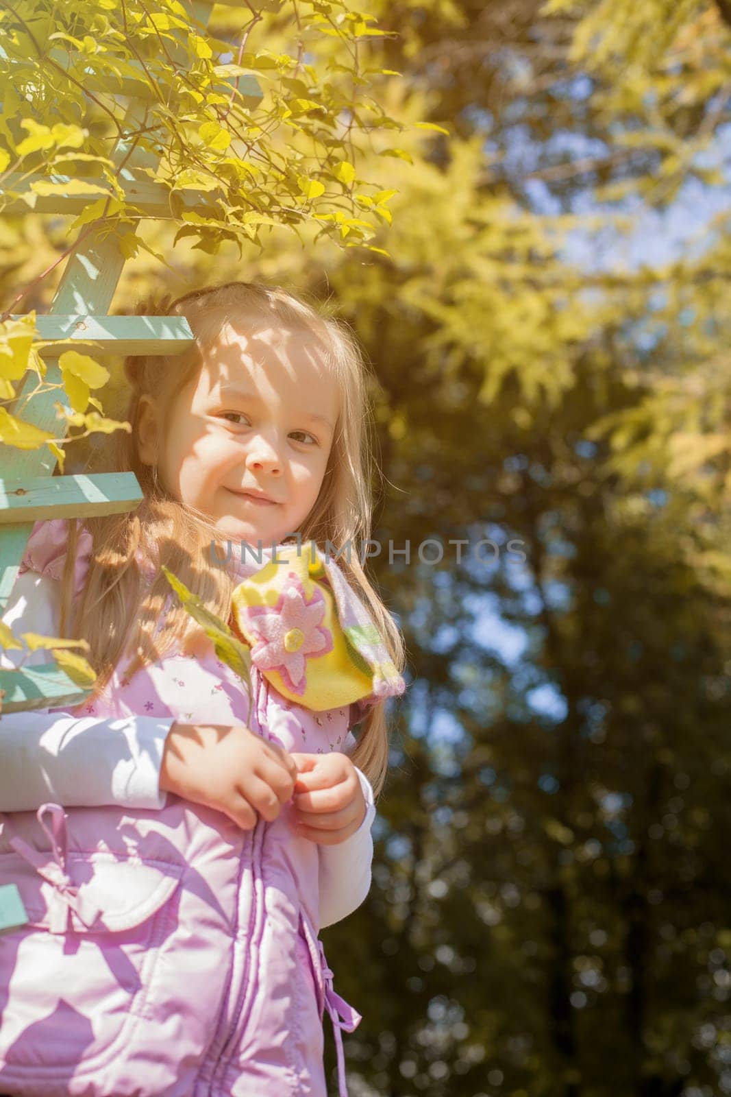 Image of smiling cute girl posing looking at camera