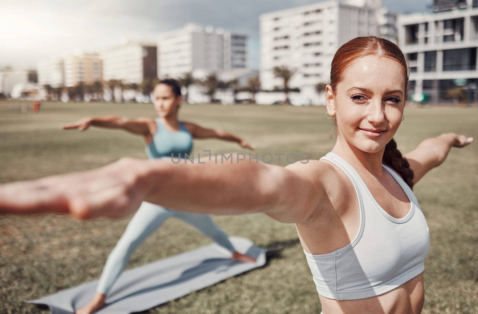 Pilates, fitness and wellness with woman friends in the park together for mental health exercise. Yoga, zen or training with a female yogi and friend outside on a grass field for a summer workout.