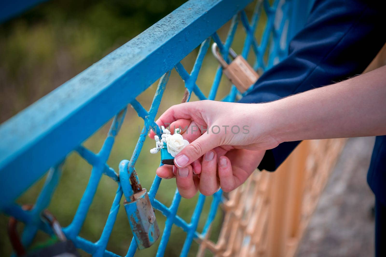 Blue lock wedding decorated with flower rose