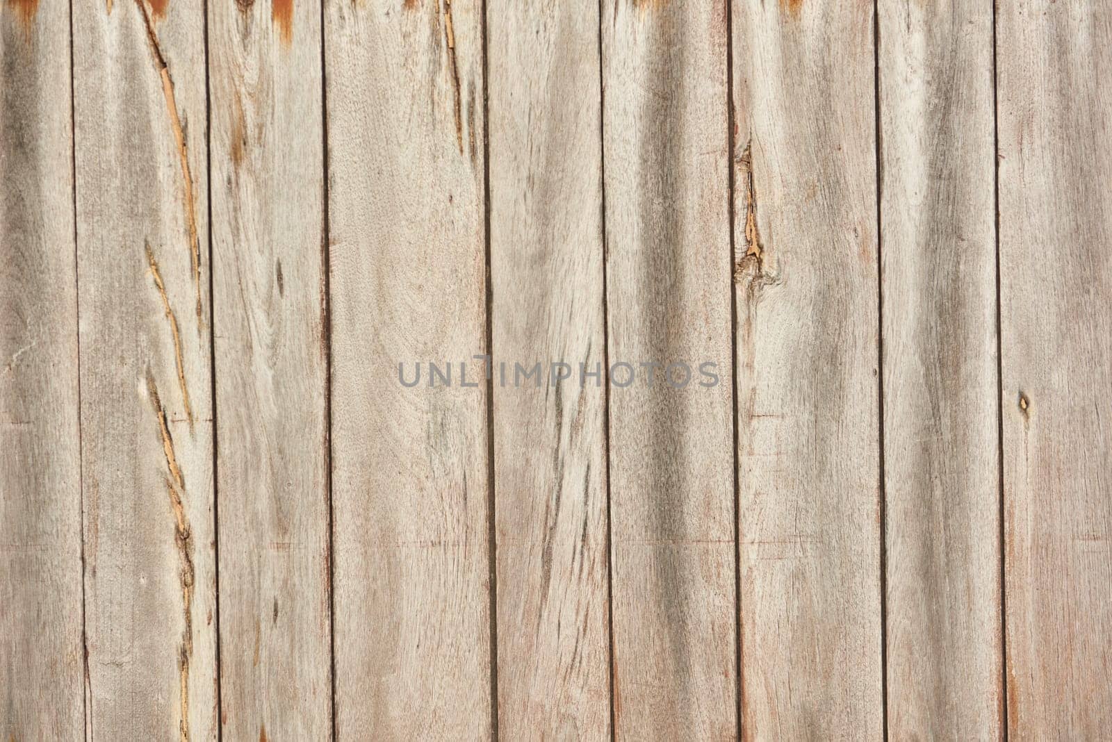 The texture of light wood planks vertical