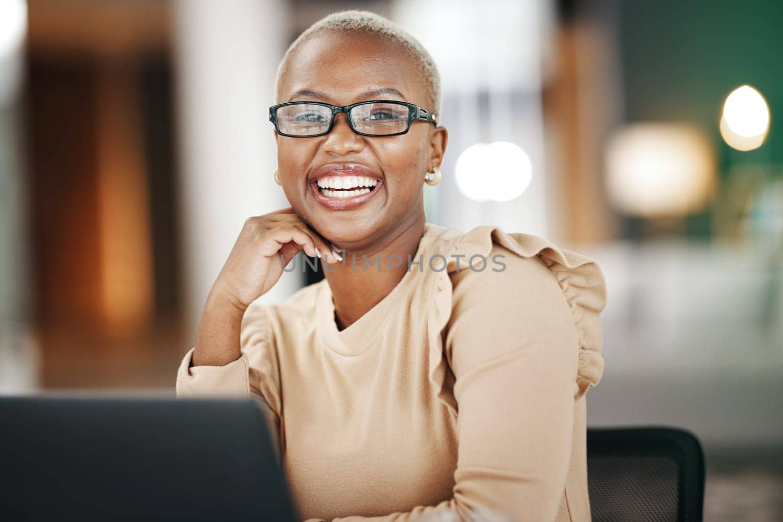 Office, laptop and portrait of black woman with glasses, smile and working on online research or report. Computer, confidence and happy African journalist writing article for digital news website