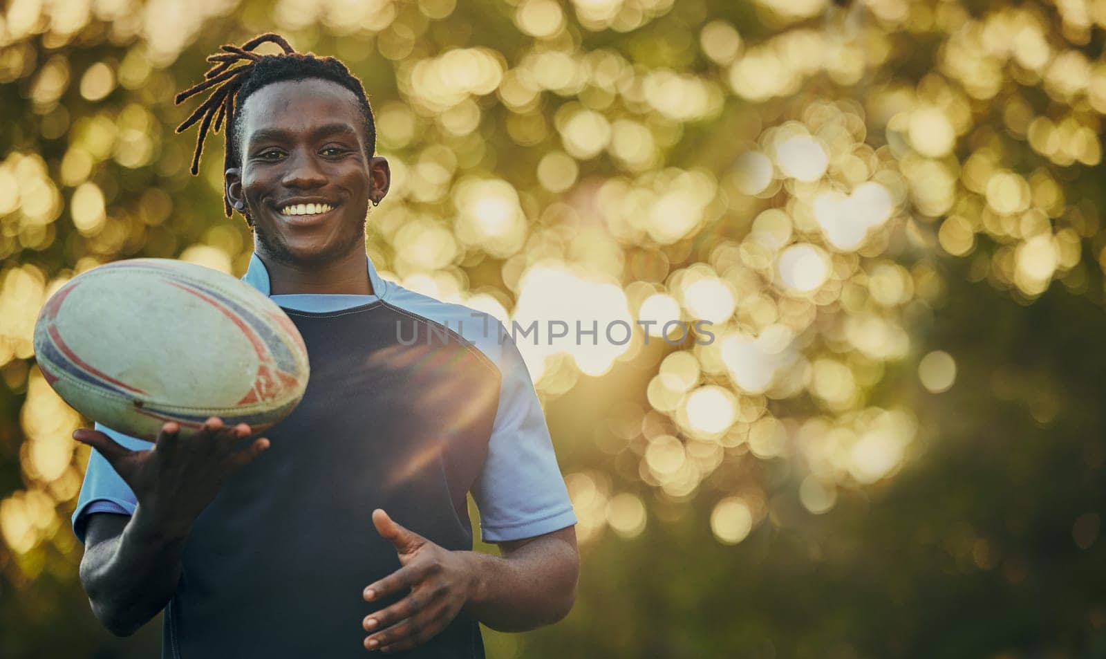 Rugby, ball and portrait of black man with smile, confidence and pride in winning game. Fitness, sports and happy face of player ready for match, workout or competition at stadium with mockup space. by YuriArcurs