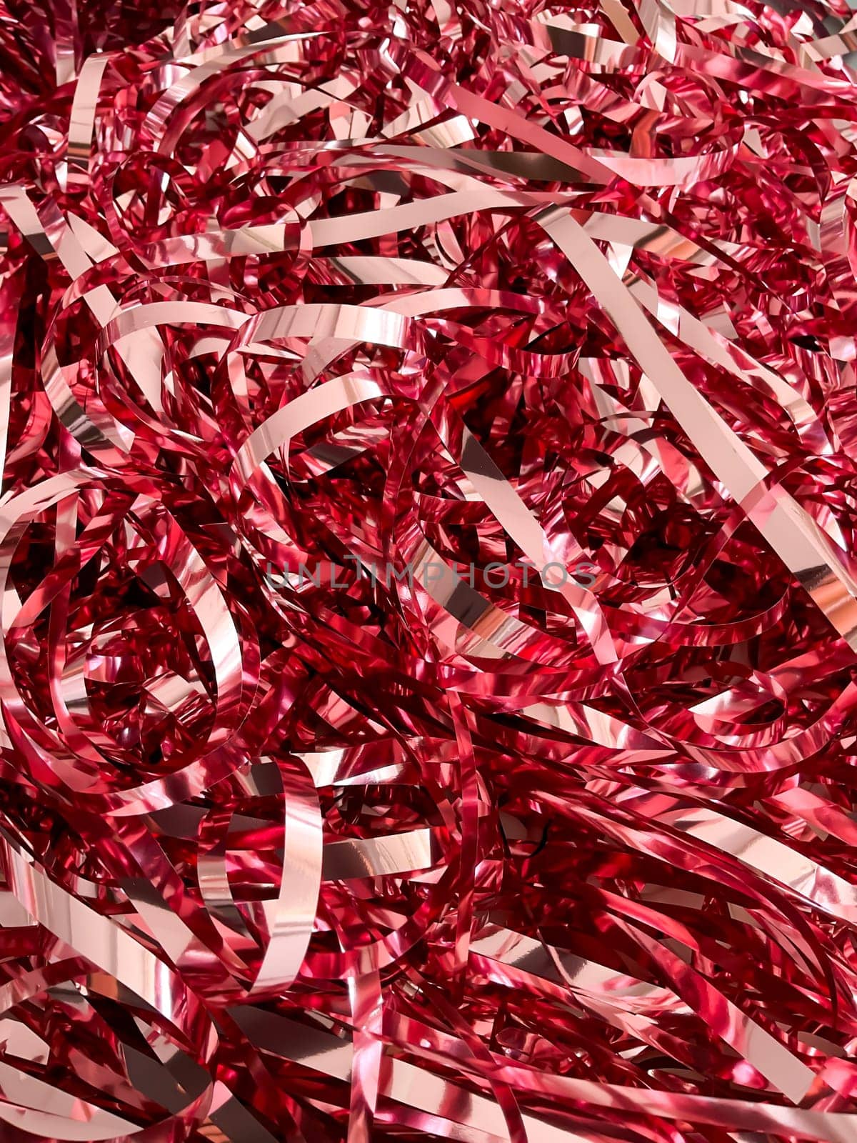 Texture of pink metal christmas tree decoration. Free space.