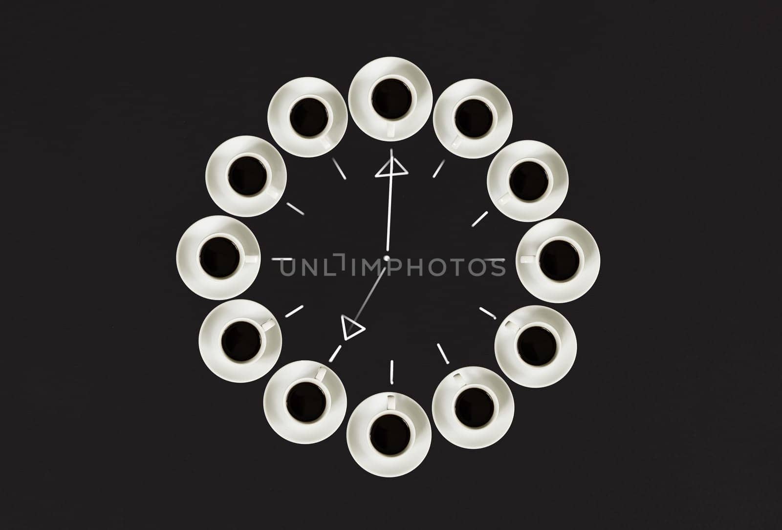 Cups with coffee, stacked in a circle. Clock consist of twenty cups. Drawing sticks lancets Time. Alarm clock. Black background. Concept time to coffee