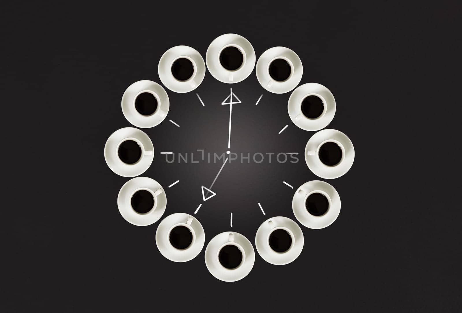 Cups with coffee, stacked in a circle. Clock consist of twenty cups. Drawing sticks lancets Time. Alarm clock. Black background. Concept time to coffee