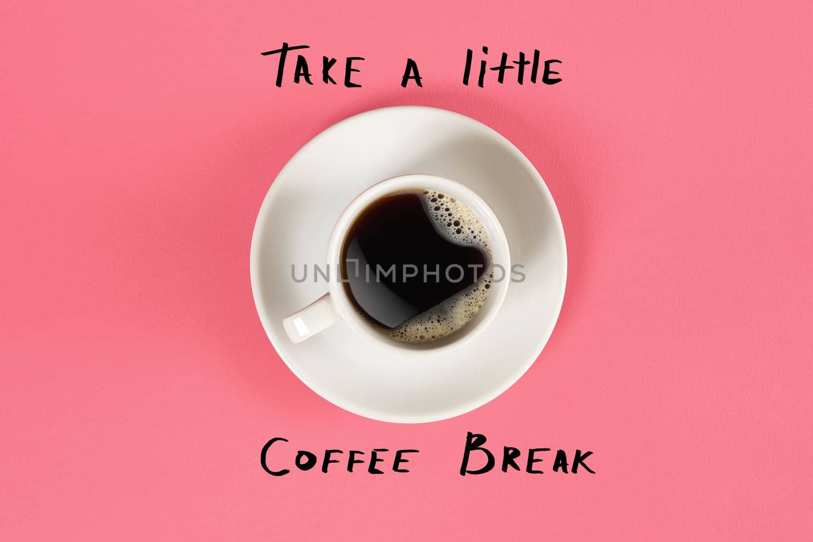 Top view of cup of black coffee and Take a little coffee break lettering isolated on pink background by nazarovsergey