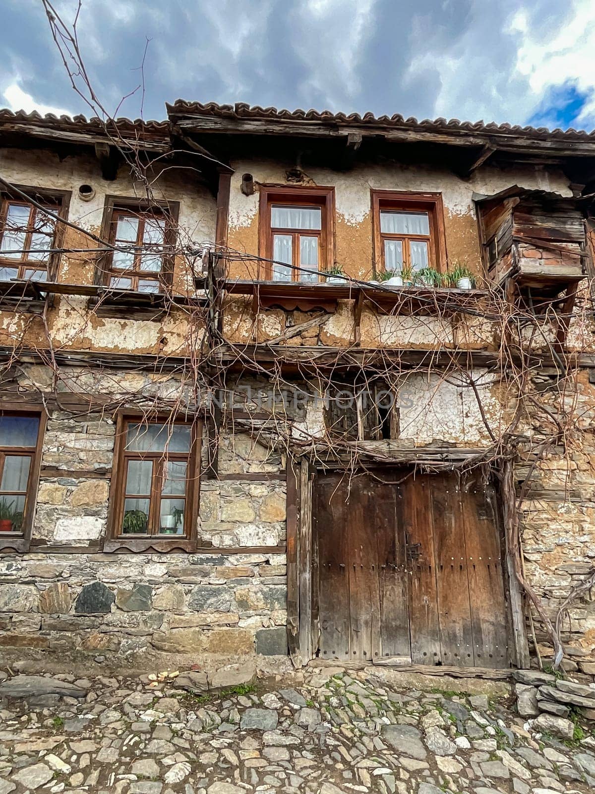 Cumalikizik village is a 700 years old Ottoman village in Turkey. Old Ottoman village in Bursa city, Turkey. Narrow street with old Ottoman houses