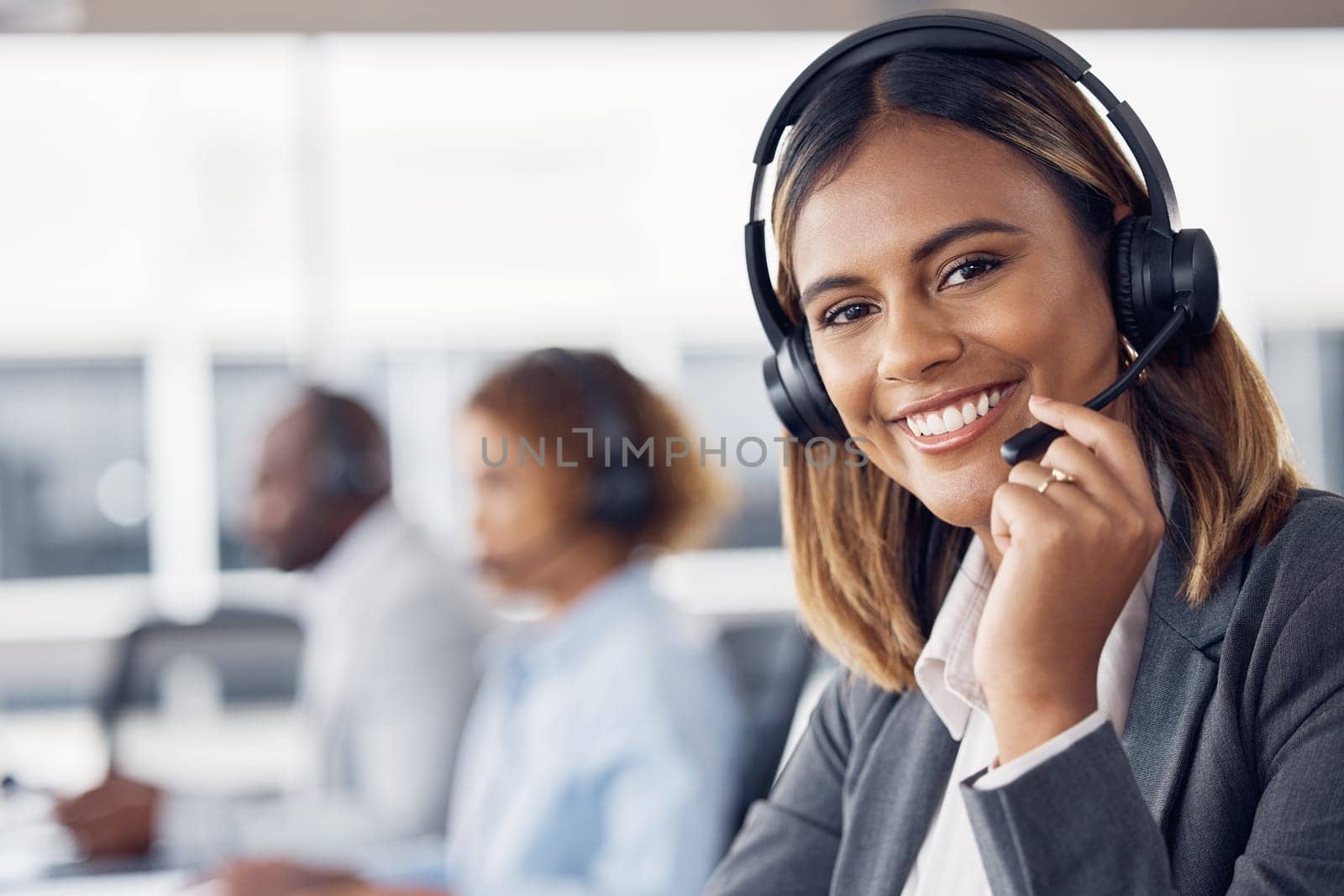 Woman, call center and smile with headset mic for telemarketing, customer service or support at the office. Portrait of happy female consultant agent smiling with headphones for online advice or help.