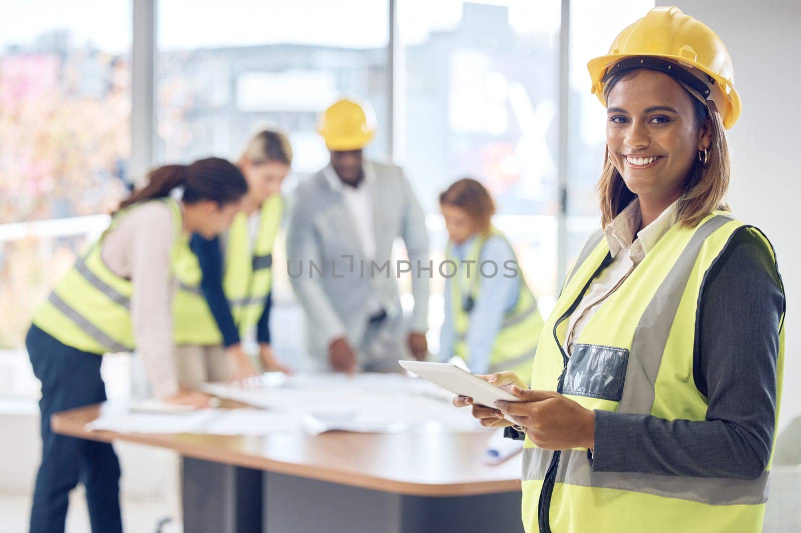 Engineering portrait, tablet and woman planning project management, industry and blueprint design in office. Construction worker face, contractor or architecture indian person with digital floor plan by YuriArcurs