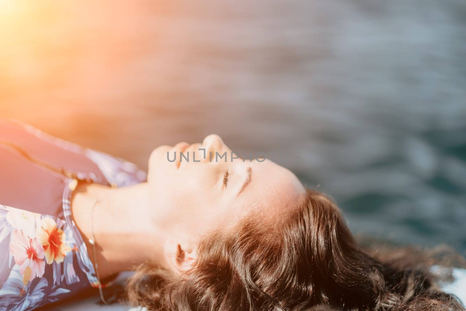 Woman sup yoga. Middle age sporty woman practising yoga pilates on paddle sup surfboard. Female stretching doing workout on sea water. Modern individual hipster outdoor summer sport activity