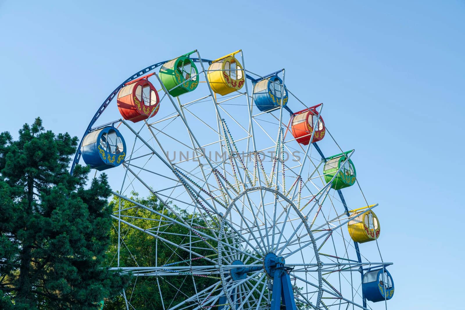 ferris wheel on a blue sky background. photo