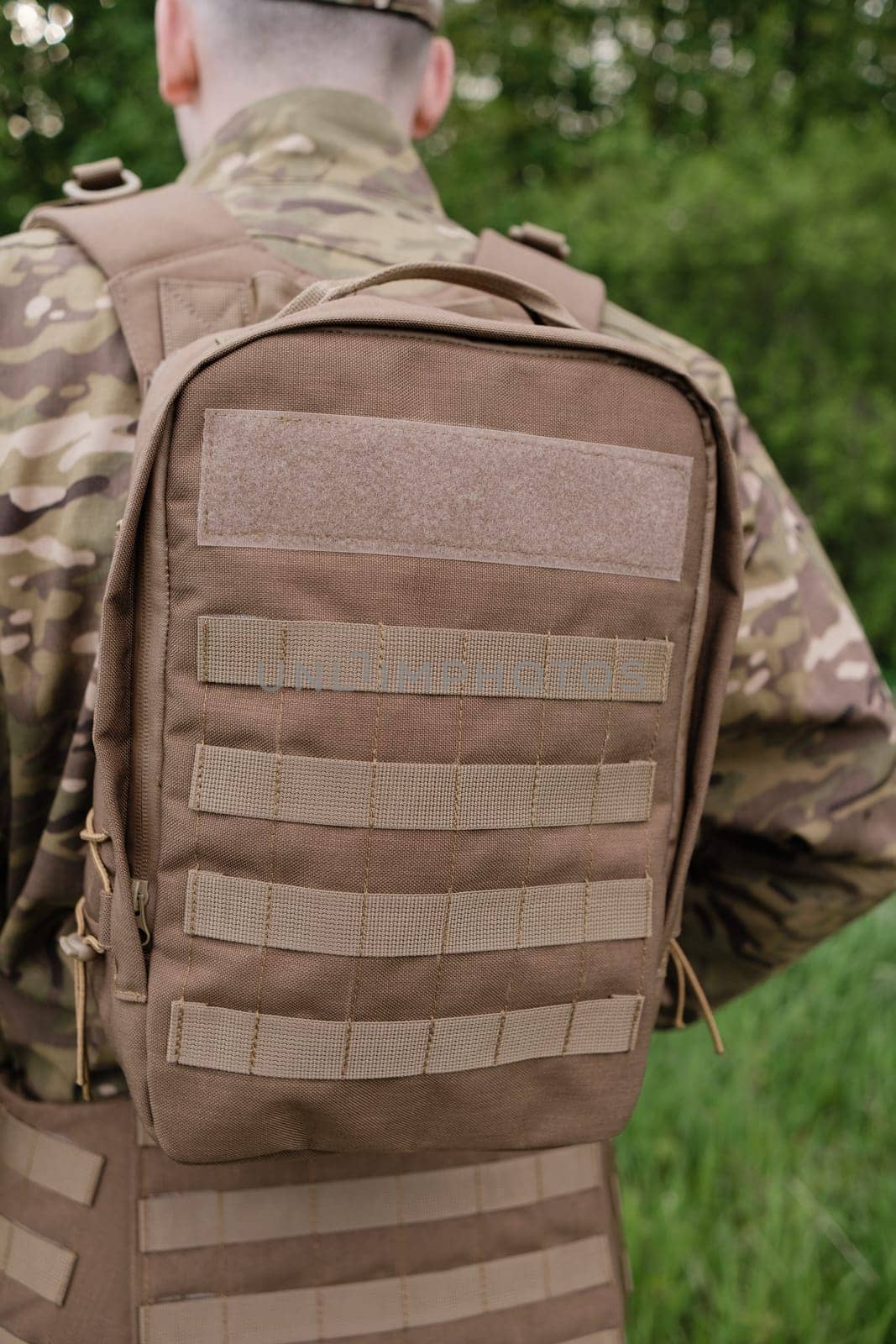 Close-up of Tactical Backpack Details on Soldier by Symonenko