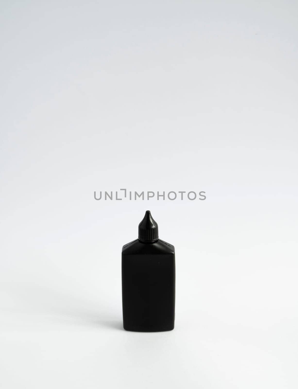 Mock up unbranded black bottle of finish line dry bicycle lubricant. Bicycle care, bicycle chain care. by vovsht