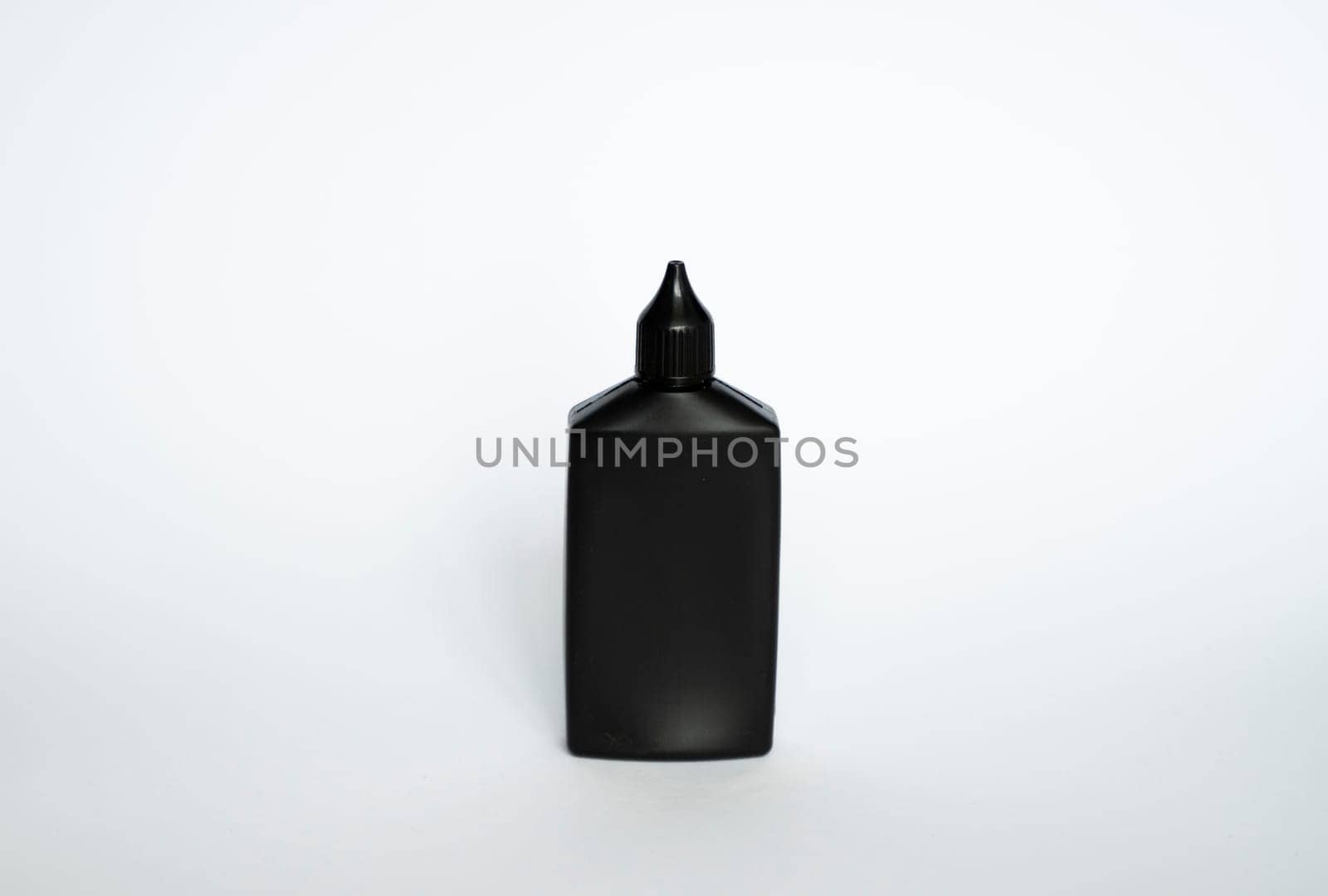 Mock up unbranded black bottle of finish line dry bicycle lubricant. Bicycle care, bicycle chain care. by vovsht