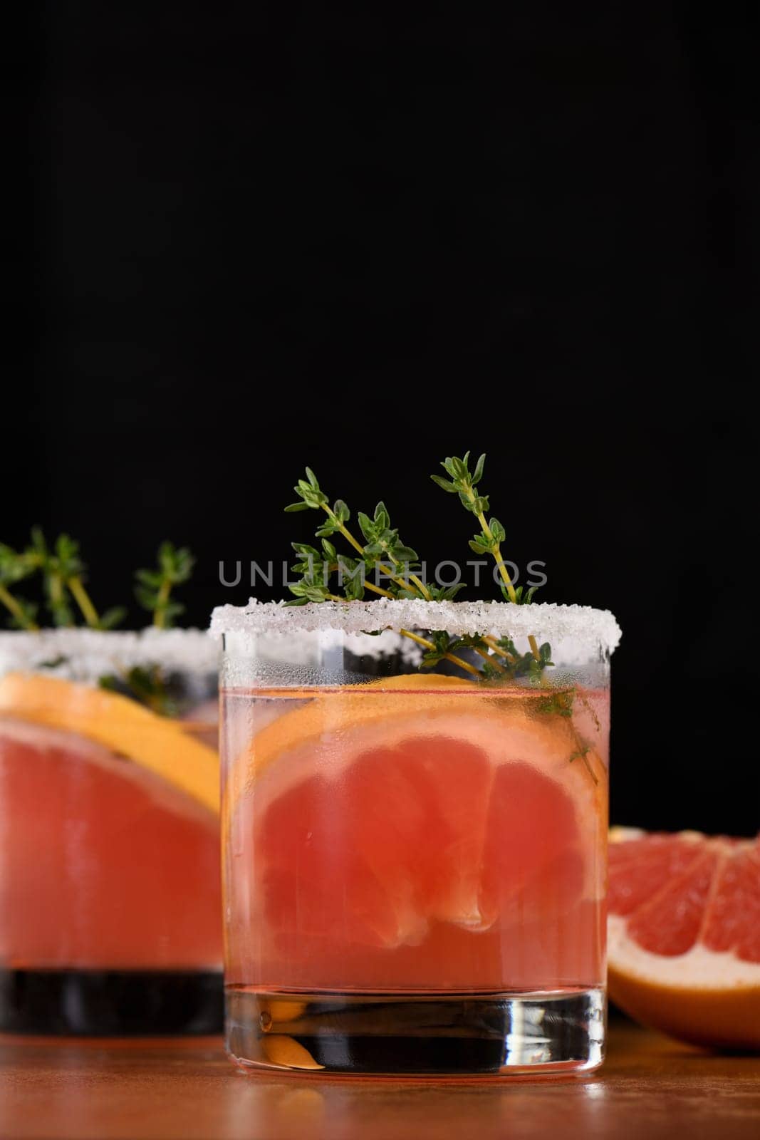 Pink Paloma with red grapefruit and tequila. The red grapefruit adds the perfect amount of sweetness, and the vibrant color of the juice makes this a great cocktail. Organic vegetarian drink.