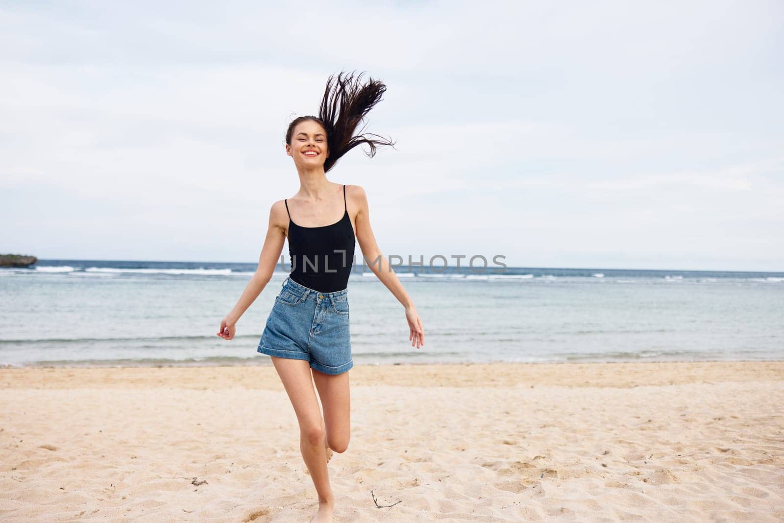 woman nature sunset summer beach sea freedom running carefree smile wave relax travel smiling hair fun lifestyle sexy happiness young happy