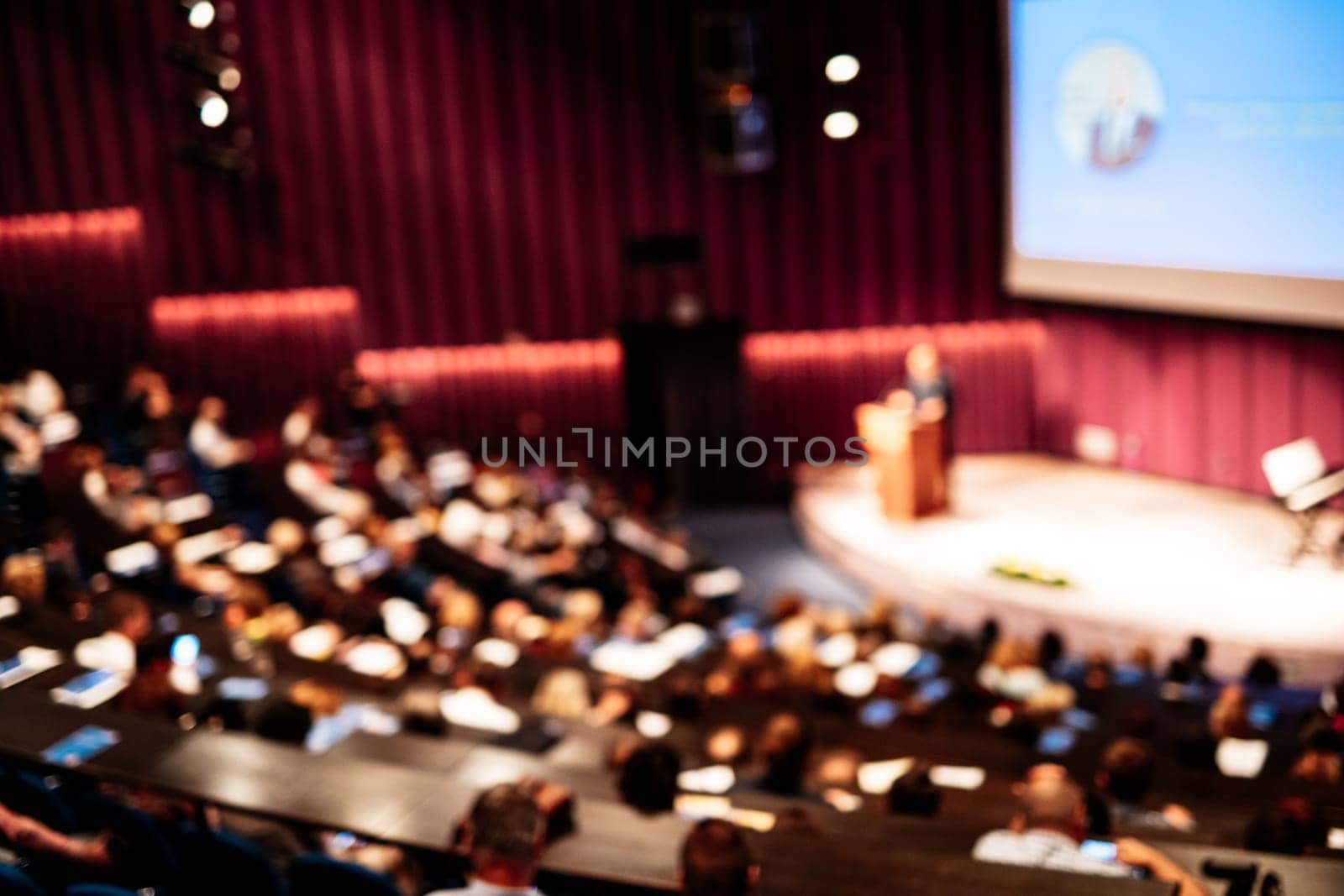 Woman giving presentation on business conference event. by kasto